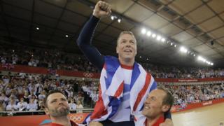 Chris Hoy celebrates winning his record sixth gold medal.