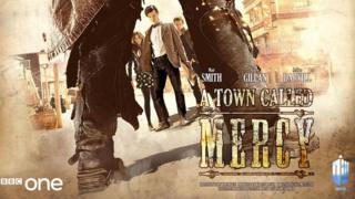 The Doctor and his companions stand in a wild west town. Before them stands what appears to be a cowboy in leather chaps.