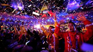 Paralympians celebrate at the closing ceremony.