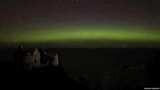 Dunluce Castle lit by the northern lights in County Antrim late last night.