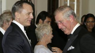 Prince Charles chats to Daniel Craig at the Skyfall premiere.