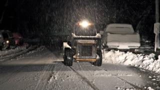 Digger in the snow.
