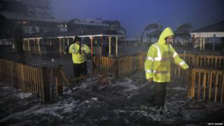 People walk through the flood water in Atlantic City.