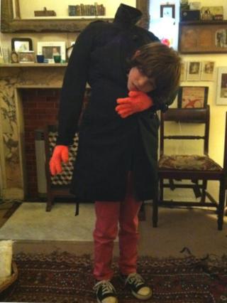 Seven-year-old Sol dressed as a headless man
