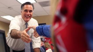 Mitt Romney greets workers at call centre on November 6, 2012 in Pittsburgh, Pennsylvania