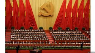 Party leaders listen to the speech of Hu Jintao, bottom, Chinese president and Communist Party general secretary, at the opening session of the Communist Party congress at the Great Hall of the People in Beijing, 8 November 2012
