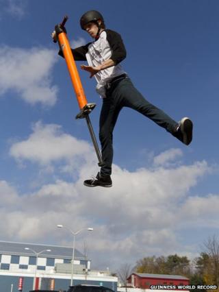 Tone Staubs in the USA breaking the record for the most pogo stick jumps in one minute