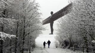 Snow covers the Angel of the North near Gateshead, northeast England