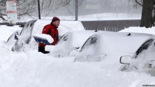 Man digs out car in Boston