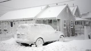 Car covered in snow