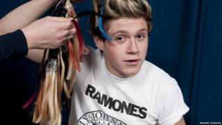 Niall from One Direction getting his hair colour matched up for this Madame Tussauds waxwork