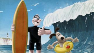 Wallace and Gromit ready to surf.
