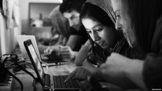 Girls learning on a laptop