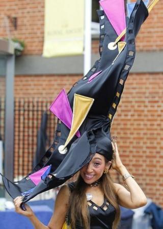 Tracy rose in a hat at Ascot