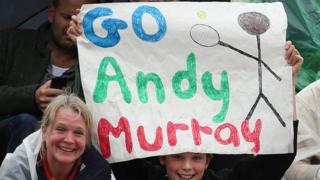 Girl holds sign supporting Murray.