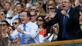 Wayne Rooney, David Cameron and Alex Salmond watching the match.