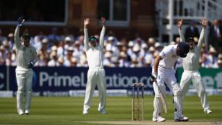 Cricketers playing on the first day of the second Ashes cricket test match