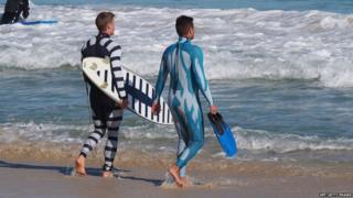 Two surfers in Australia wear 'shark-proof' wetsuits