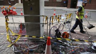 Cleaners outside the hospital
