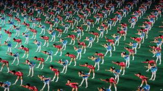 Children performing in North Korea