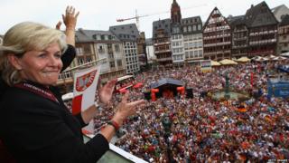 Head coach Silvia Neid of Germany celebrates winning the UEFA Women"s EURO 2013 on the balcony of the Roemer on July 29, 2013 in Frankfurt am Main, Germany