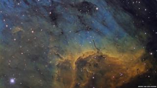 Thick dust and gas clouds of the Pelican Nebula
