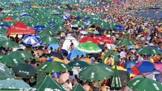 People on a beach in China