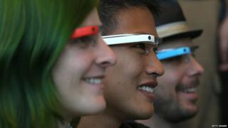 Attendees wear Google Glass while posing for a group photo during the Google I/O developer conference