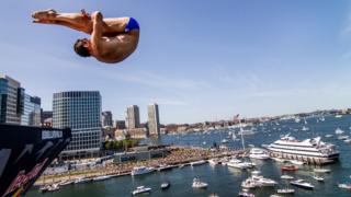 Diver Michal Navratil diving from a 27.5 metre platform in Boston