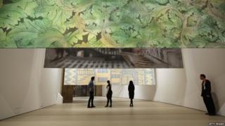 Members of the public admire an installation artwork by Ayse Erkmen entitled "Intervals" in The Curve art space in the Barbican Centre on September 23, 2013 in London, England.