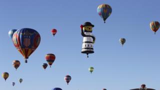 Balloons in the air at the 42nd Albuquerque International Balloon Fiesta.