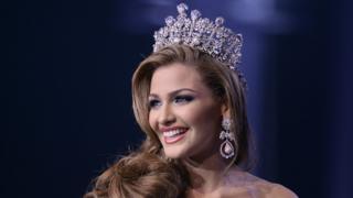 The new Miss Venezuela 2013, Migbelis Castellanos reacts after being selected in Caracas.