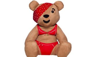 Bear in a bright red bikini and bandana.