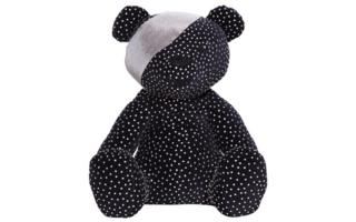 A black bear studded with silver and a silver bandana