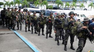 Troops prepare to leave Manila for Tacloban.