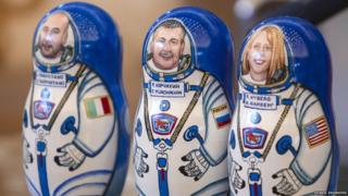 Russian dolls with astronauts face on them