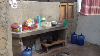 temporary kitchen in makeshift family home