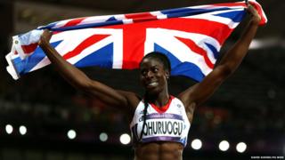 Christine Ohuruogu holding up a union flag