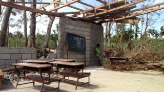 Classroom with roof and walls destroyed