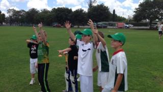 Children playing cricket in South Africa
