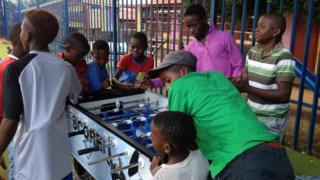 Children in South Africa playing at a youth club