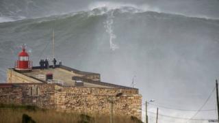 Garrett McNamara rides huge wave