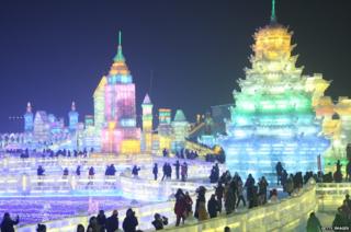 Ice sculptures resembling skyscrapers and a temple