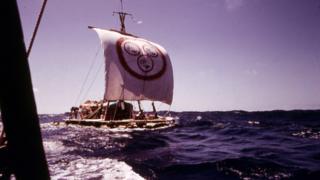 Raft at sea with a square sail