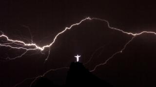 The statue of Christ the Redeemer in a lightning storm