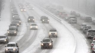 A busy snow-covered motorway