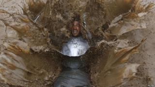 Tough Guy competitor falls into muddy water