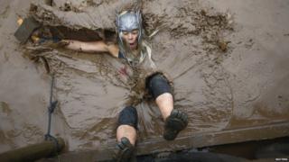 Tough Guy competitor falls into muddy water