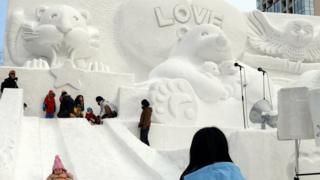 Snow sculpture and slide
