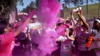 Runners covered in pink paint